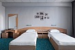 Маринс Парк Отель Ростов - Стандарт двухкомнатный с одной двуспальной и двумя односпальными кроватями